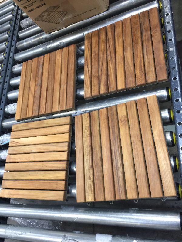 Photo 1 of Bare Decor Solid Oiled Teak Wood Interlocking 9-Slat Flooring Tiles - 8 pack