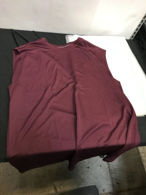 Photo 1 of MEN'S SLEEVELESS WORK OUT SHIRT SIZE LARGE