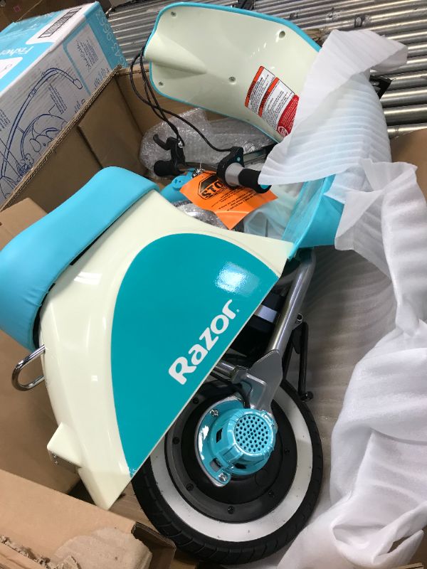 Photo 3 of Razor Pocket Mod Petite - 12V Miniature Euro-Style Electric Scooter for Ages 7 and Up, Hub-Driven Motor, Air-Filled White Wall Tires, Up to 40 min Ride Time, Blue--Must carefully place attachment for steering 
