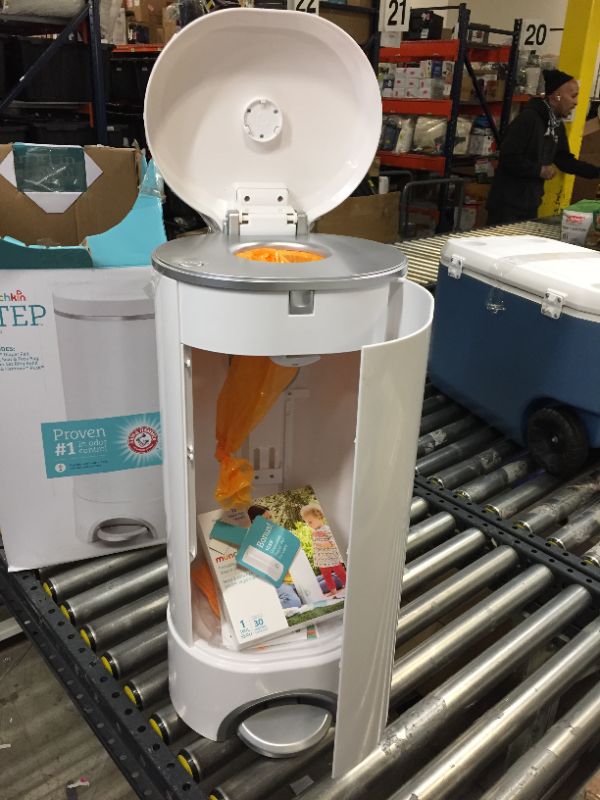 Photo 1 of Munchkin Step Diaper Pail Powered by Arm & Hammer, Includes (1) Snap, Seal and Toss Bag, (1) Starter Ring Refill, (1) Lavender scented baking soda puck and (1) Toss Disposable Diaper Pail
