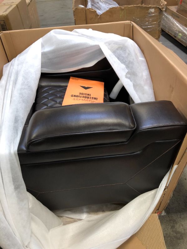 Photo 1 of Signature Design by Ashley Warnerton Faux Leather Power Recliner with Adjustable Headrest, Brown
