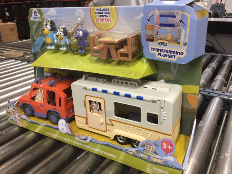 Photo 1 of Bluey Ultimate Caravan Adventures - Caravan Playset and Three 2.5-3" Figures & 4WD Family Vehicle with 2 Surfboards, Multicolor
