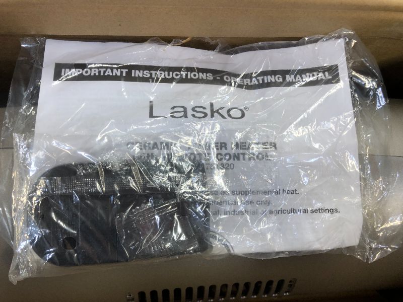 Photo 4 of Lasko Lasko-22 Digital Ceramic Oscillating Remote (751320) Tower Heater, 8.5x2033 L x 7.25x2033 W x 23x2033 H, Grey/Black