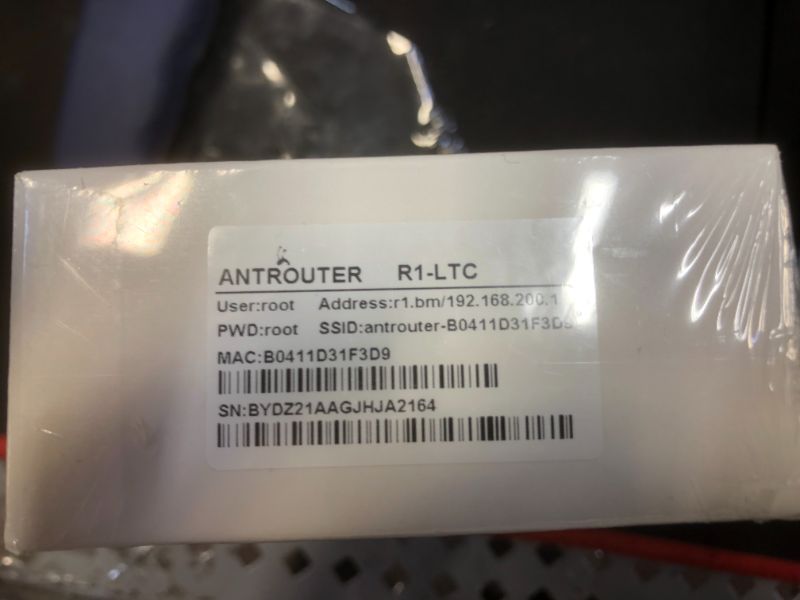 Photo 2 of AntRouter R1-LTC ~1.29MH/s ASIC Litecoin Miner with Built-in WiFi Router (AntRouter R1-LTC @ 1.29MH/s)-FACTORY SEALED UNABLE TO PROPERLY TEST 
