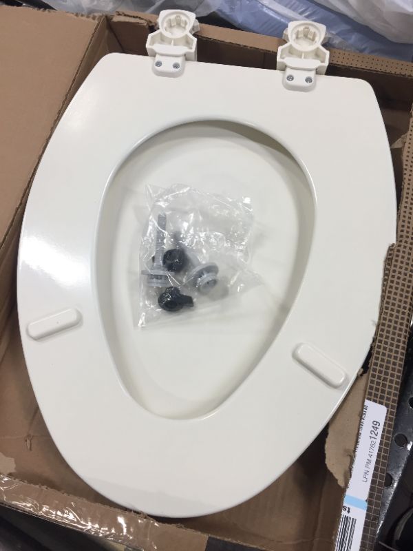 Photo 1 of Bemis 1500EC Elongated Wood Toilet Seat Biscuit