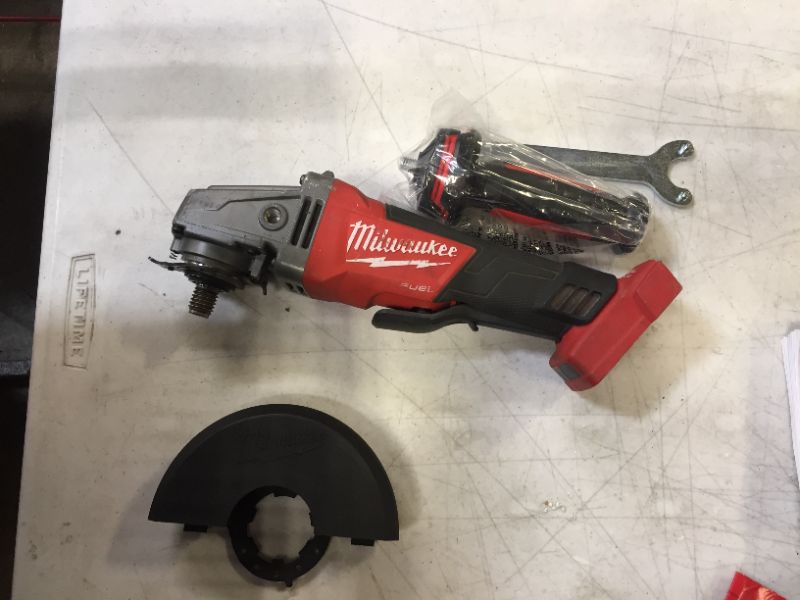 Photo 2 of M18 FUEL 18-Volt Lithium-Ion Brushless Cordless 4-1/2 in./5 in. Grinder w/Paddle Switch (Tool-Only)
