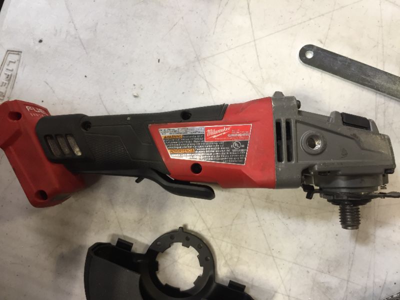 Photo 3 of M18 FUEL 18-Volt Lithium-Ion Brushless Cordless 4-1/2 in./5 in. Grinder w/Paddle Switch (Tool-Only)
