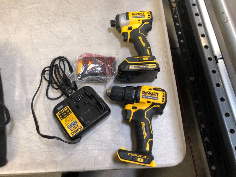 Photo 2 of ATOMIC 20-Volt MAX Cordless Brushless Compact 1/4 in. Impact Driver Kit/w ATOMIC 20V 1/2 in. Drill/Driver (Tool-Only)
