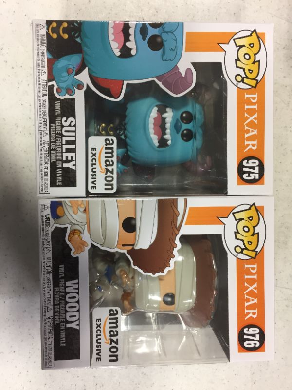 Photo 1 of 2 pop figures