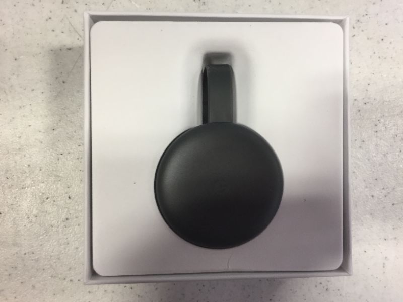 Photo 2 of Google Chromecast - Streaming Device with HDMI Cable - Stream Shows, Music, Photos, and Sports from Your Phone to Your TV
