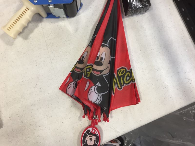 Photo 1 of Mickey Mouse umbrella and rain jacket 