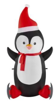 Photo 1 of 6.5 ft Pre-Lit LED Airblown Penguin with Skates Christmas Inflatable
