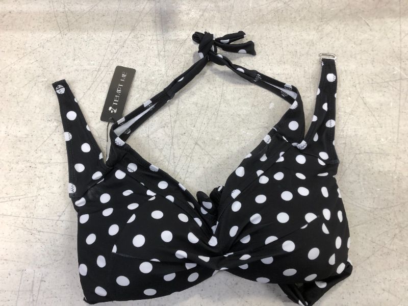 Photo 1 of medium sized womens bathing suit top color black and white 