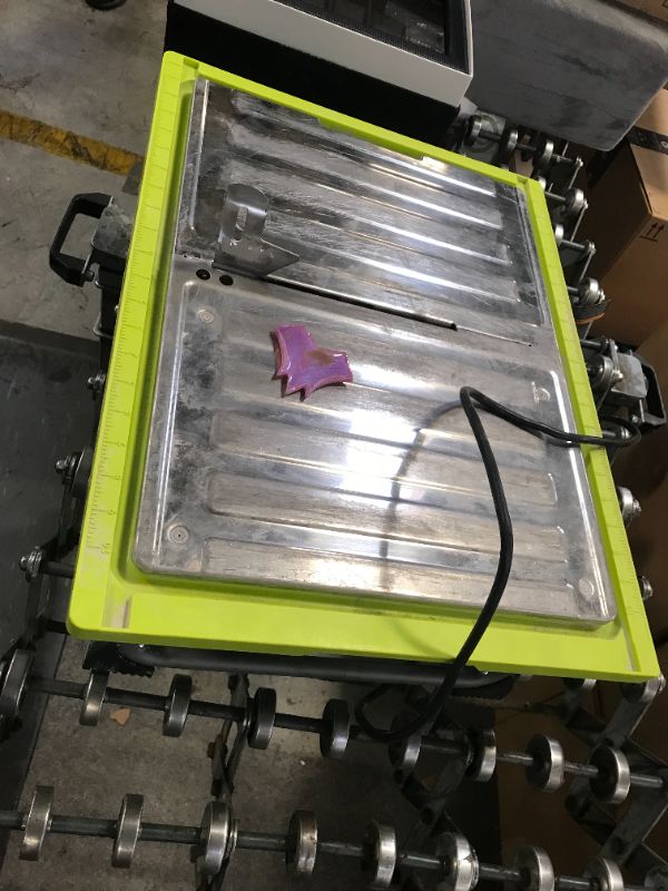 Photo 1 of Ryobi WS722 7 Inch 4.8 Amp Portable Tabletop Wet Tile Saw with Miter Guide and Induction Motor - used / damaged