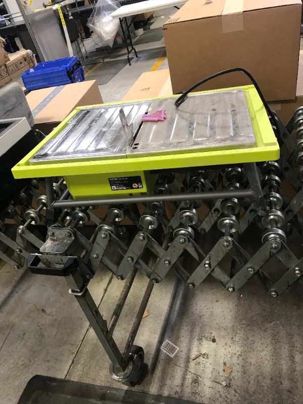 Photo 1 of Ryobi WS722 7 Inch 4.8 Amp Portable Tabletop Wet Tile Saw with Miter Guide and Induction Motor - used / damaged