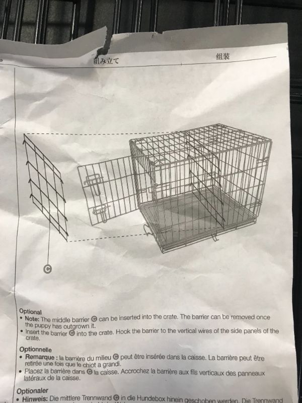 Photo 1 of large dog crate