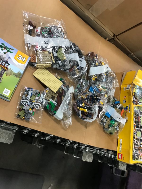 Photo 3 of LEGO Creator 3in1 Medieval Castle 31120 Building Kit; Castle with Moat and Drawbridge, Plus 3 Minifigures; New 2021 (1,426 Pieces)
