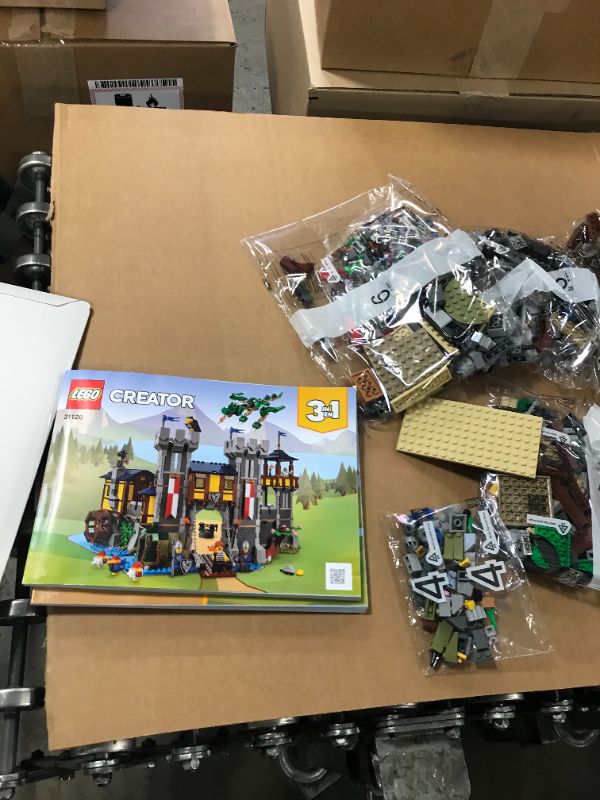 Photo 2 of LEGO Creator 3in1 Medieval Castle 31120 Building Kit; Castle with Moat and Drawbridge, Plus 3 Minifigures; New 2021 (1,426 Pieces)
