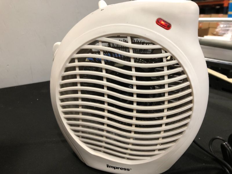 Photo 1 of Impress IM-701 1500-Watt Compact Fan Heater with Adjustable Thermostat, White
