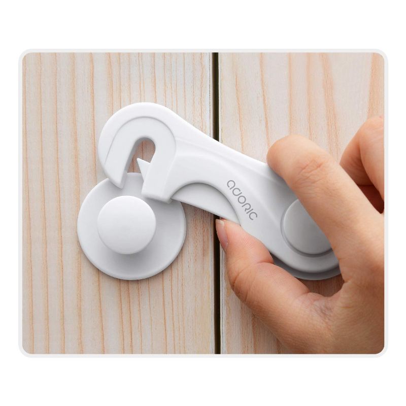 Photo 1 of Cabinet Locks - Adoric Life Child Safety Locks 4 Pack - Baby Safety Cabinet Locks - Baby Proofing Cabinet Kitchen System with Strong Adhesive Tape
