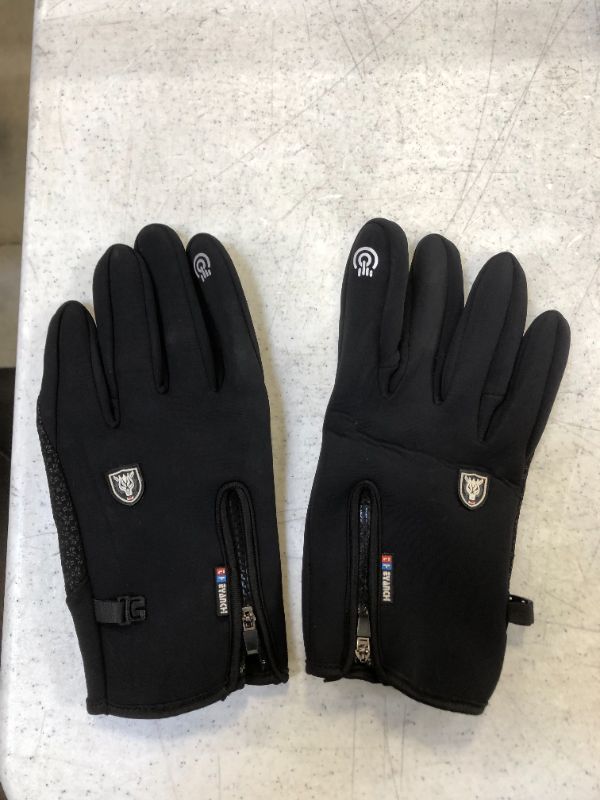 Photo 1 of outside gloves color black size large 