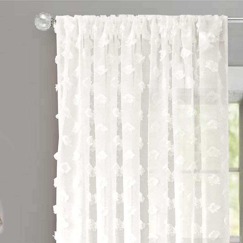 Photo 1 of DriftAway Olivia White Voile Chiffon Sheer Window Curtains Embroidered with Pom Pom 2 Panels Rod Pocket 52 Inch by 63 Inch Off White
SINGLE PANEL