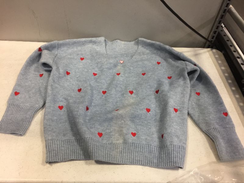 Photo 1 of  BLUE SWEATER WITH RED HEARTS-UNKNOWN SIZE (ITEM HAS SOME COLOR OFF-STAIN LIKE)