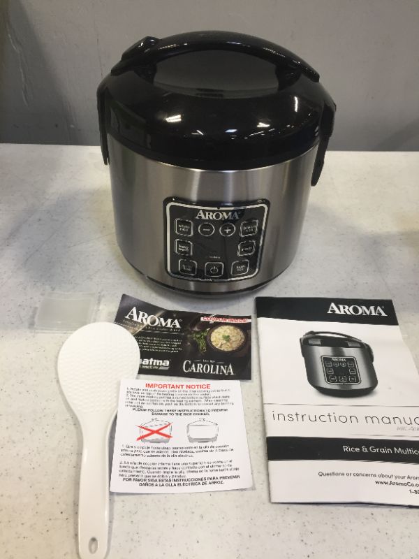 Photo 7 of Aroma Digital Rice Cooker and Food Steamer, Silver, 8 Cup---- POWERS ON/UNABLE TO TEST FOR FULL FUNCTIONALITY (DENT ON SIDE SHOW IN PICTURE) 