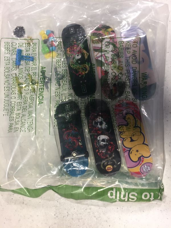 Photo 1 of bundle of dgk tech decks 