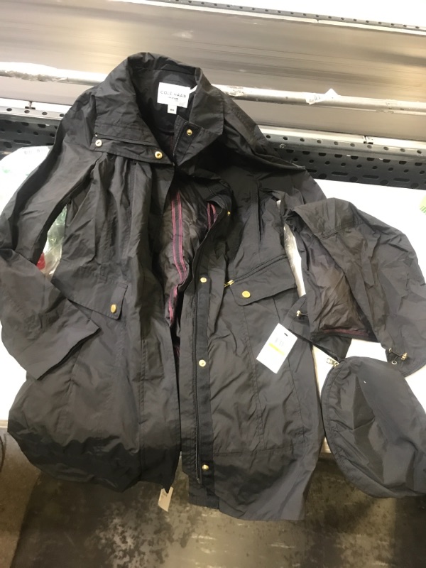 Photo 2 of Cole Haan Women's Travel Packable Rain Jacket
Size: M
Color: Black