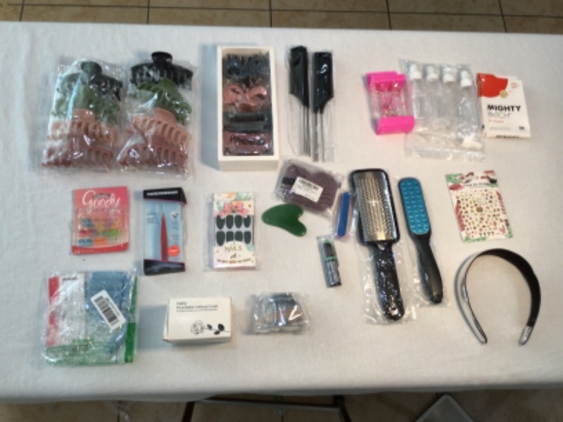 Photo 1 of Bundle of Assorted Women's Beauty Products-See photos-Hair Clips, Slant Tweezer, Small Wire Mesh Rollers, Foundation MakeUp Brush, Lipstick BlueGreen, Green Facial Rock, Nails Green, Hair Ties, Combs, Hair Bands, Nail Art Stickers, Spray Bottles, Foot Ras