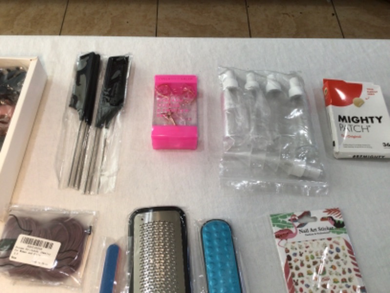 Photo 2 of Bundle of Assorted Women's Beauty Products-See photos-Hair Clips, Slant Tweezer, Small Wire Mesh Rollers, Foundation MakeUp Brush, Lipstick BlueGreen, Green Facial Rock, Nails Green, Hair Ties, Combs, Hair Bands, Nail Art Stickers, Spray Bottles, Foot Ras