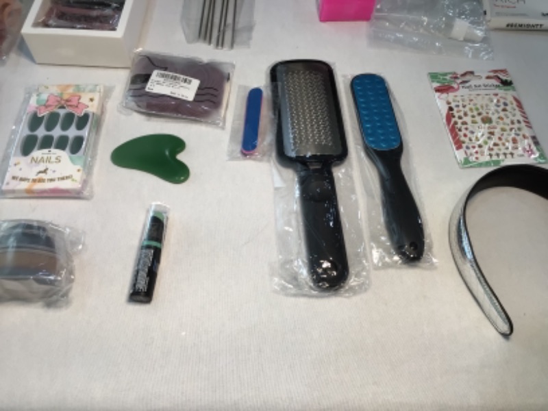 Photo 5 of Bundle of Assorted Women's Beauty Products-See photos-Hair Clips, Slant Tweezer, Small Wire Mesh Rollers, Foundation MakeUp Brush, Lipstick BlueGreen, Green Facial Rock, Nails Green, Hair Ties, Combs, Hair Bands, Nail Art Stickers, Spray Bottles, Foot Ras
