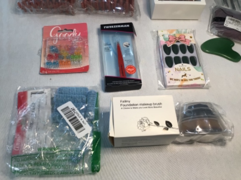 Photo 4 of Bundle of Assorted Women's Beauty Products-See photos-Hair Clips, Slant Tweezer, Small Wire Mesh Rollers, Foundation MakeUp Brush, Lipstick BlueGreen, Green Facial Rock, Nails Green, Hair Ties, Combs, Hair Bands, Nail Art Stickers, Spray Bottles, Foot Ras