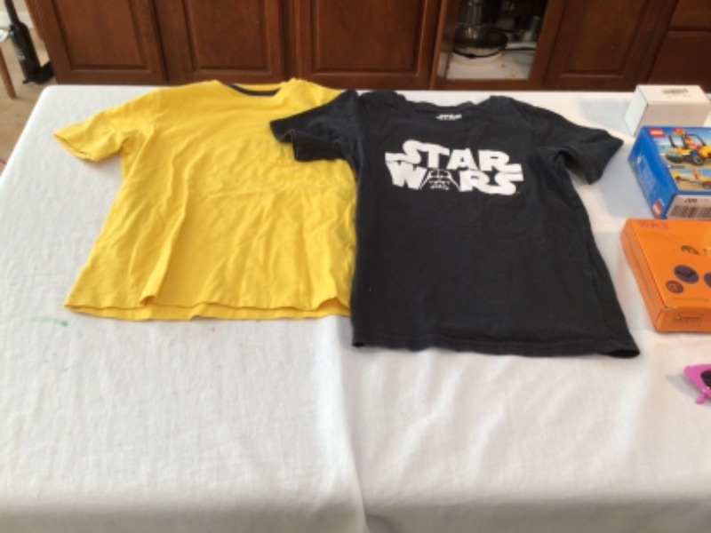 Photo 3 of T Shirts- Black Star Wars and Yellow Plain- size 7, Lego Toy 60286 Beach Rescue ATV, Cat Eye Sunglasses, Zipper Pull Charms, Stickers, Kidz Bop 2021 CD, Game Card Holder, Atlantic Stone Swimming Pool Toy, Wild Republic Stuffed Lions (2)