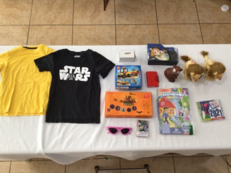 Photo 1 of T Shirts- Black Star Wars and Yellow Plain- size 7, Lego Toy 60286 Beach Rescue ATV, Cat Eye Sunglasses, Zipper Pull Charms, Stickers, Kidz Bop 2021 CD, Game Card Holder, Atlantic Stone Swimming Pool Toy, Wild Republic Stuffed Lions (2)