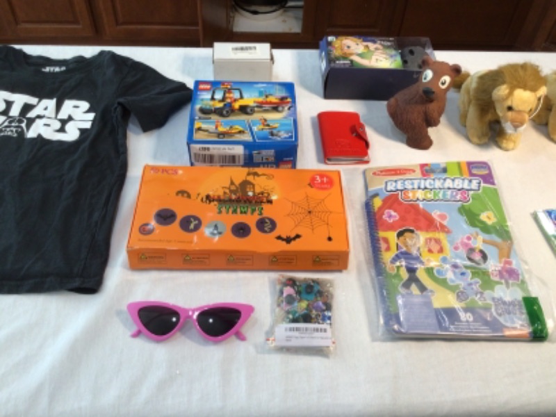 Photo 5 of T Shirts- Black Star Wars and Yellow Plain- size 7, Lego Toy 60286 Beach Rescue ATV, Cat Eye Sunglasses, Zipper Pull Charms, Stickers, Kidz Bop 2021 CD, Game Card Holder, Atlantic Stone Swimming Pool Toy, Wild Republic Stuffed Lions (2)