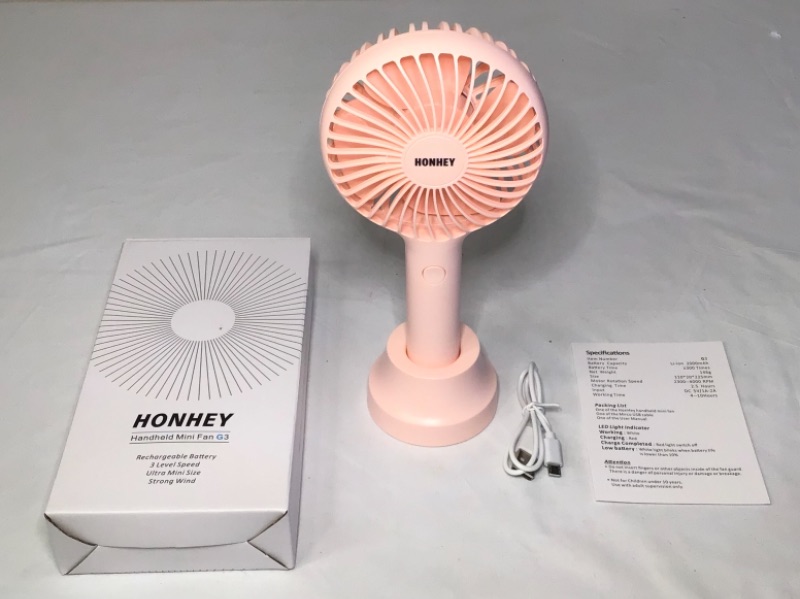 Photo 3 of HonHey Handheld Fan Portable, Mini Hand Held Fan with USB Rechargeable Battery, 3 Speed Personal Desk Table Fan with Base, 8-12 Hours Operated Small Makeup Eyelash Fan for Women Girls Kids Outdoor- Color Pink