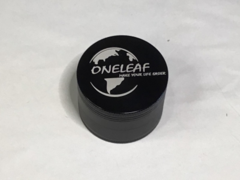 Photo 2 of One Leaf  2.5" 4 Piece Herb Grinder Large Spice Grinder with Pollen Catcher,Metal Black