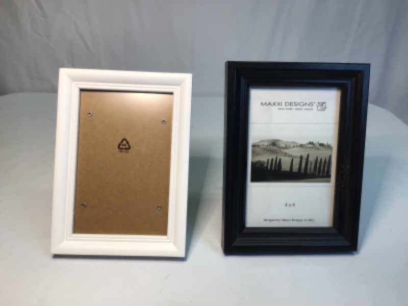 Photo 2 of 2 Picture Frames- 4.x 6- Not Matching. One White One Black