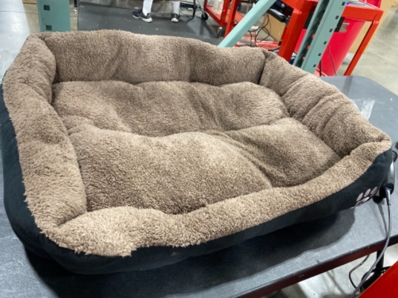 Photo 1 of black and brown dog bed