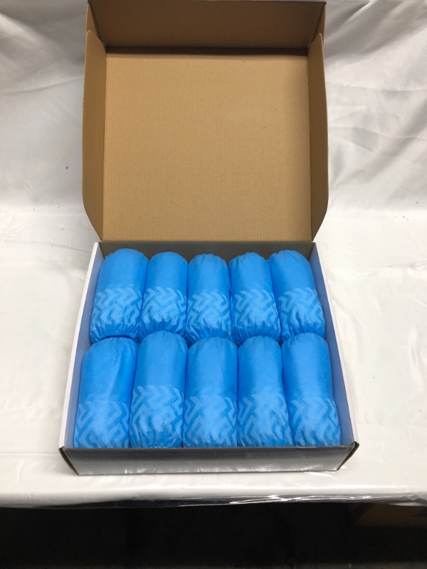 Photo 1 of 100 PIECES 50 PAIR PREMIUM DISPOSABLE SHOE COVERS 