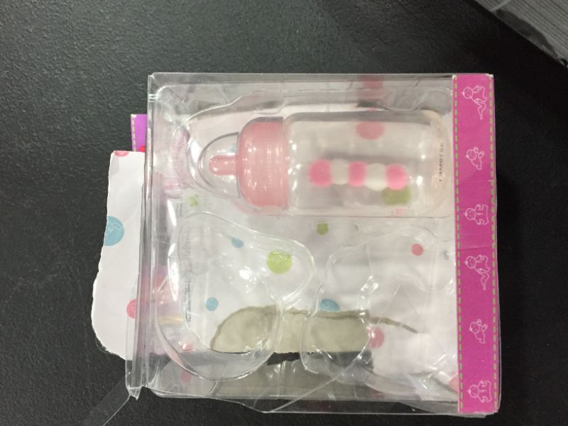 Photo 1 of JC Toys For Keeps! Pink Bottle, Rattle, and Pacifier Accessory Set.