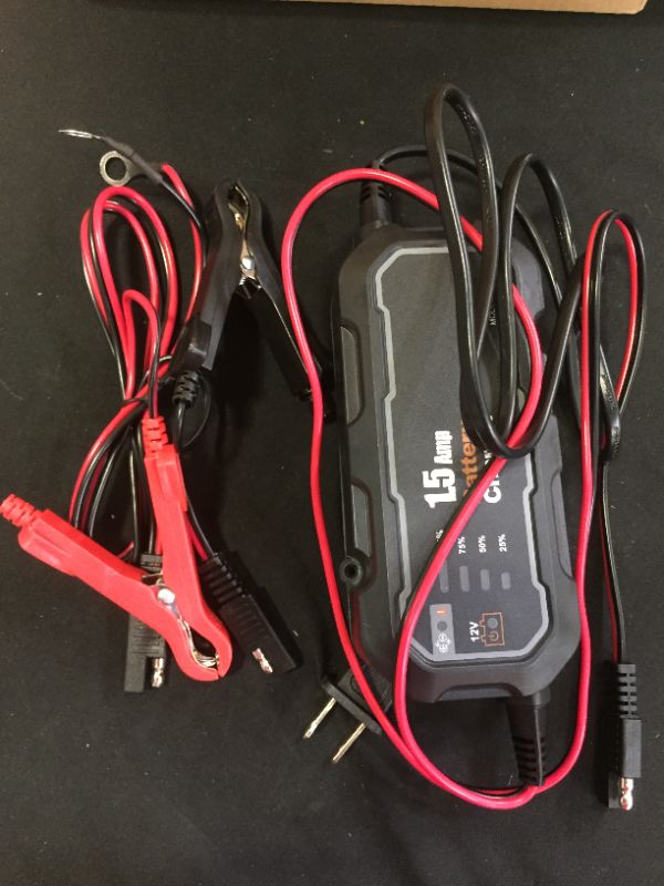 Photo 2 of 1.5 amp battery charger ----unable to test 