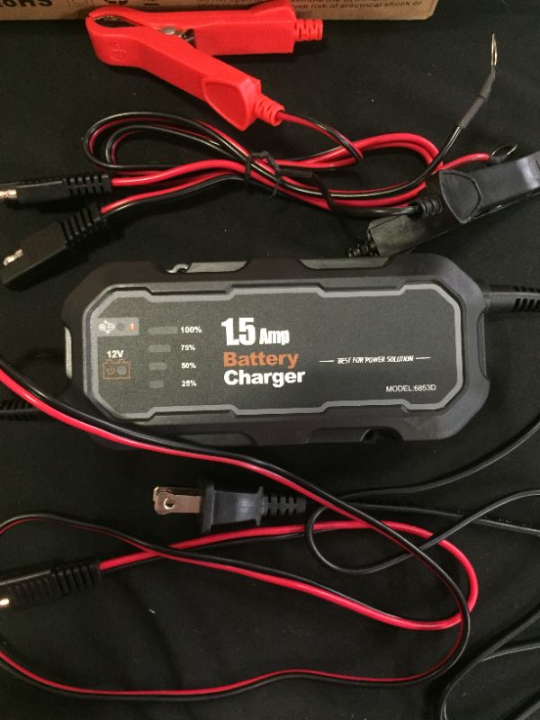 Photo 1 of 1.5 amp battery charger ----unable to test 