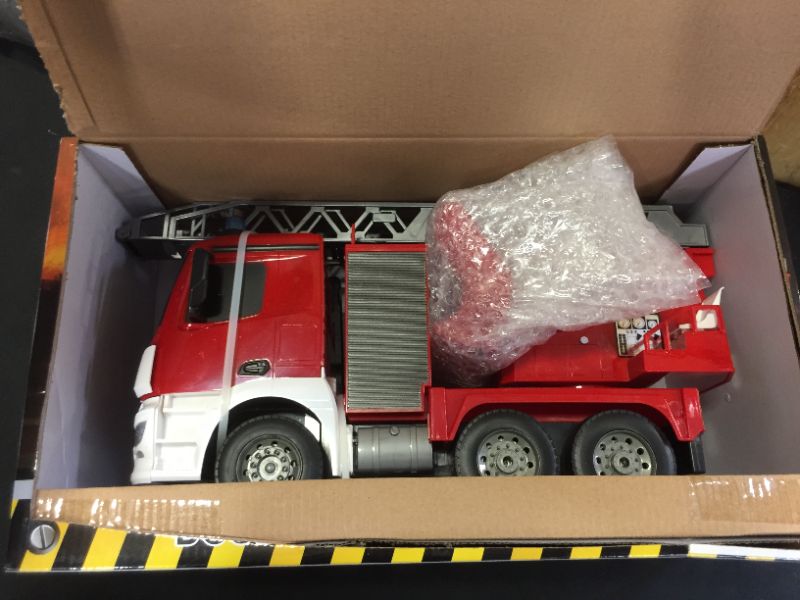 Photo 2 of DOUBLE E Benz Licensed Remote Control Fire Truck Shoots Water Extendable 18 Inch Rescue Ladder 10 Channel Fire Engine Working Sounds Lights RC Trucks for Kids
