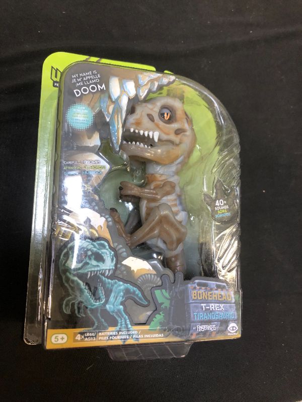 Photo 2 of WowWee Untamed Skeleton T-Rex by Fingerlings – Doom (Ash) – Interactive Collectible Dinosaur