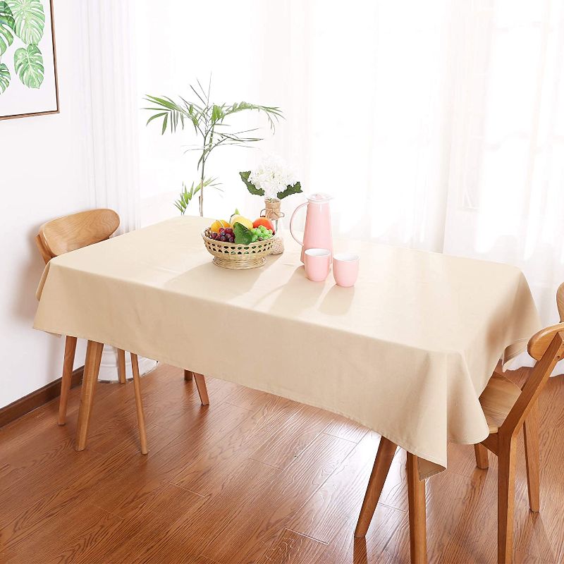 Photo 1 of Molaxhome Plain Table Cloths Rectangle Tablecloth Washable Polyester for Restaurant Pub Oblong Buffet Table Parties Holiday Dinner Wedding (Beige, 55''x86'')