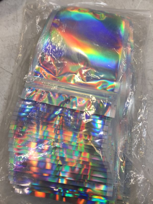 Photo 2 of  100 pack Resealable Mylar Bags, Holographic Color Heat Sealable Ziplock Foil Pouches for Multipurpose Storage (4 X 6 inches)
