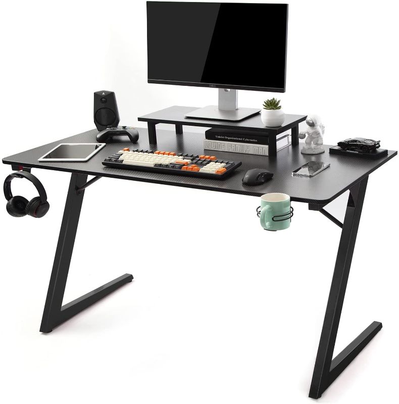 Photo 1 of TOPSKY Gaming Computer Desk Home Office Gaming Table with Cup Holder Headphone Hook Z Shaped Leg(47.2”, All Black)
